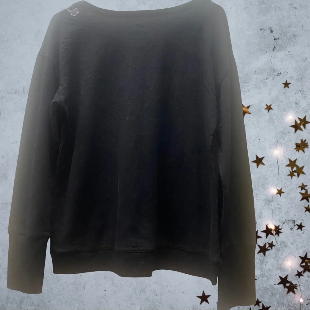 Black long-sleeve Justice top with pink and silver glitter stars Sz. 20